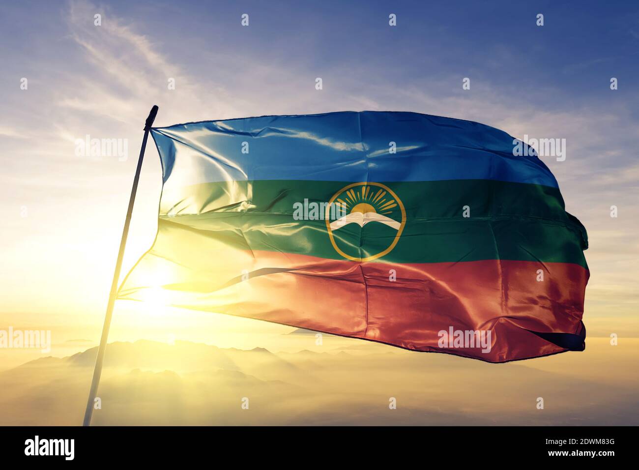 Karachay-Cherkessia Republic of Russia flag waving on the top sunrise mist fog Stock Photo