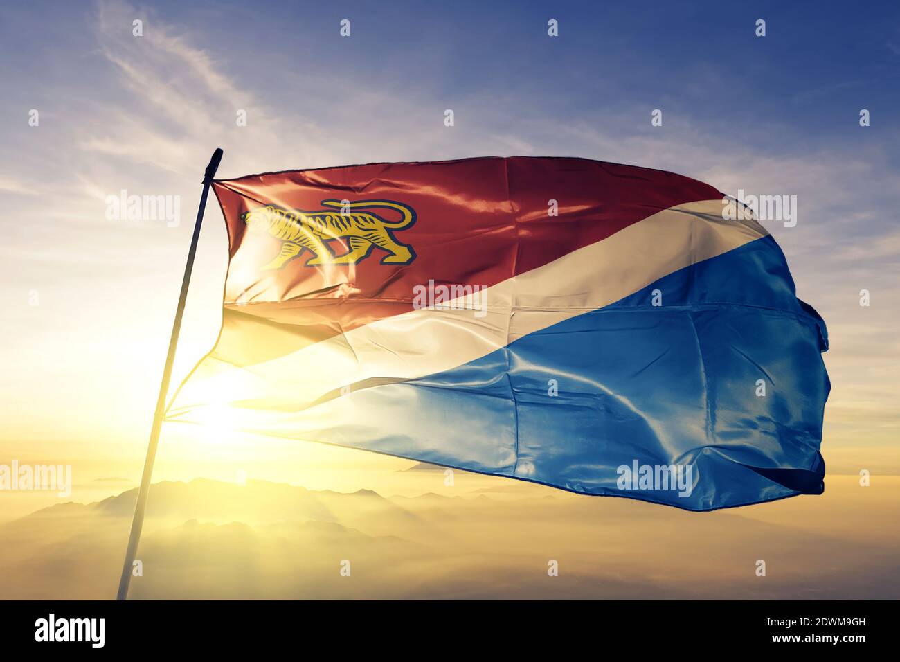 Primorsky Krai of Russia flag waving on the top sunrise mist fog Stock ...