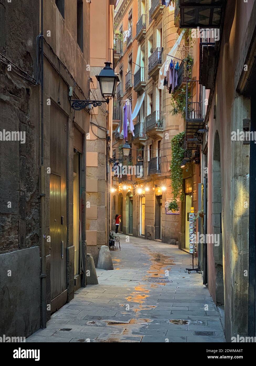 Empty Alley Amidst Buildings In City Stock Photo