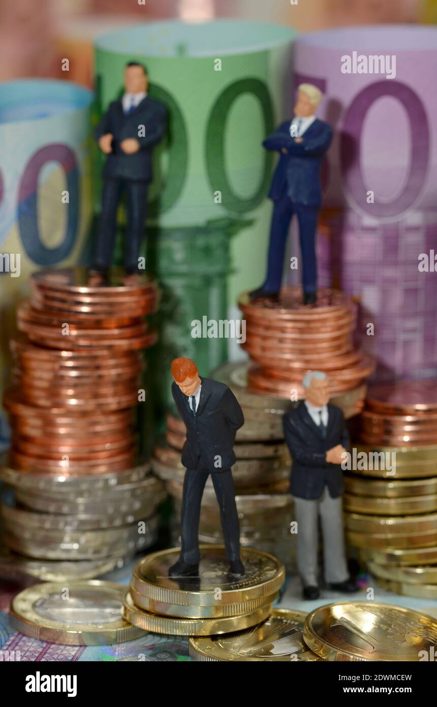 Centmuenzen, Euromuenzen, Euroscheine, Miniaturfiguren, Manager Stock Photo