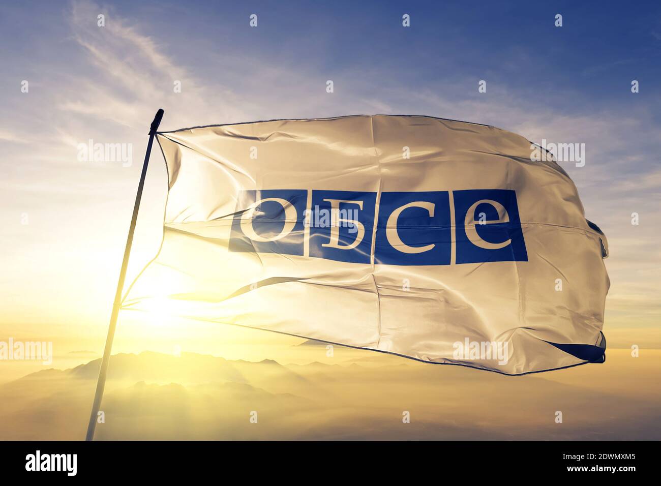 Organization for Security and Co-operation in Europe Russian version OSCE flag waving on the top Stock Photo
