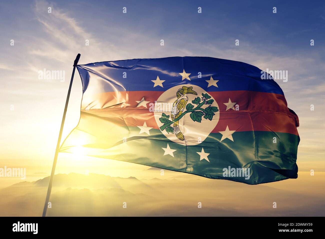 Chin State flag waving on the top sunrise mist fog Stock Photo - Alamy