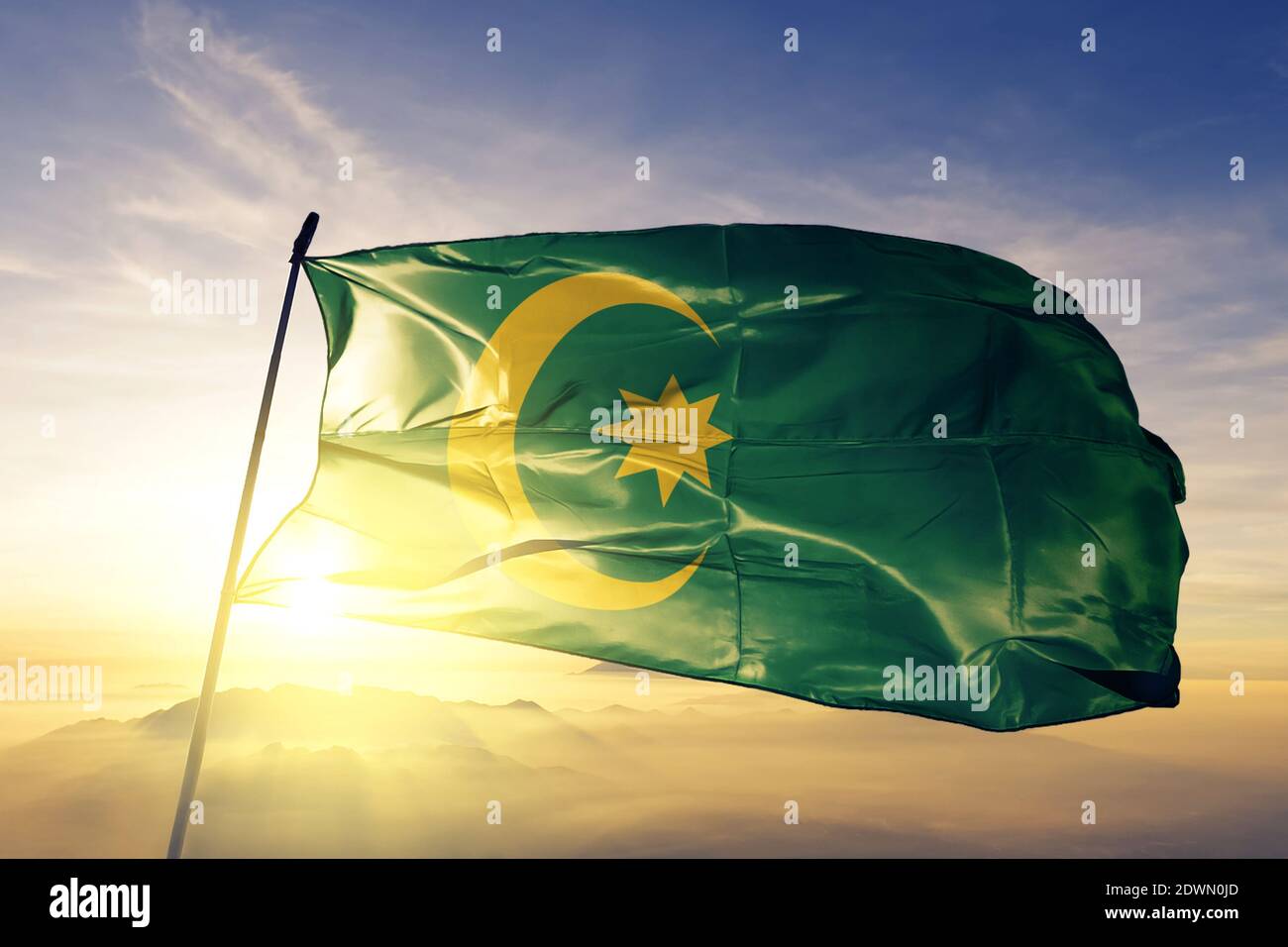 Ottoman Caliphate flag waving on the top sunrise mist fog Stock Photo
