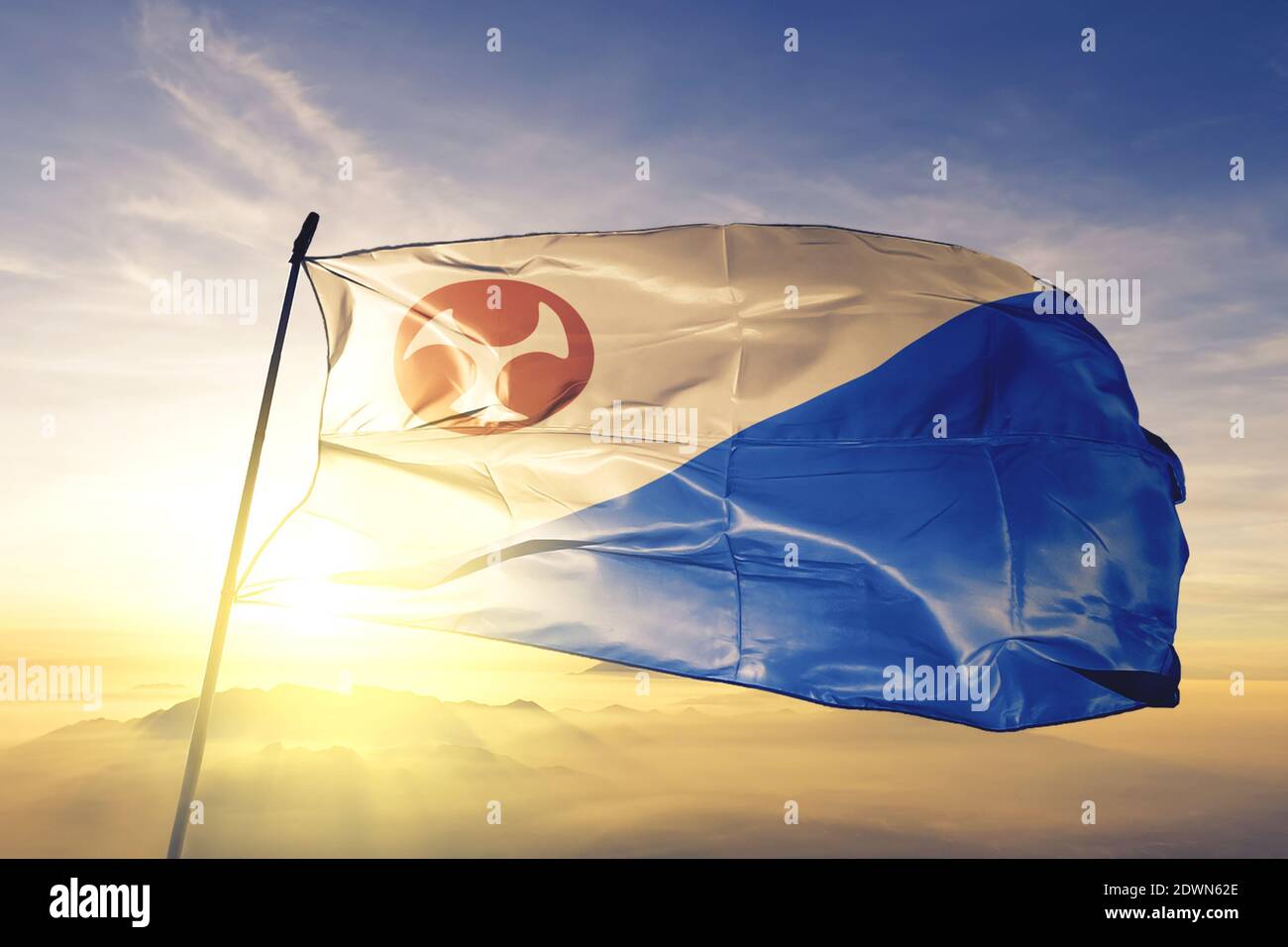 Jeju province of South Korea flag waving on the top sunrise mist fog Stock Photo