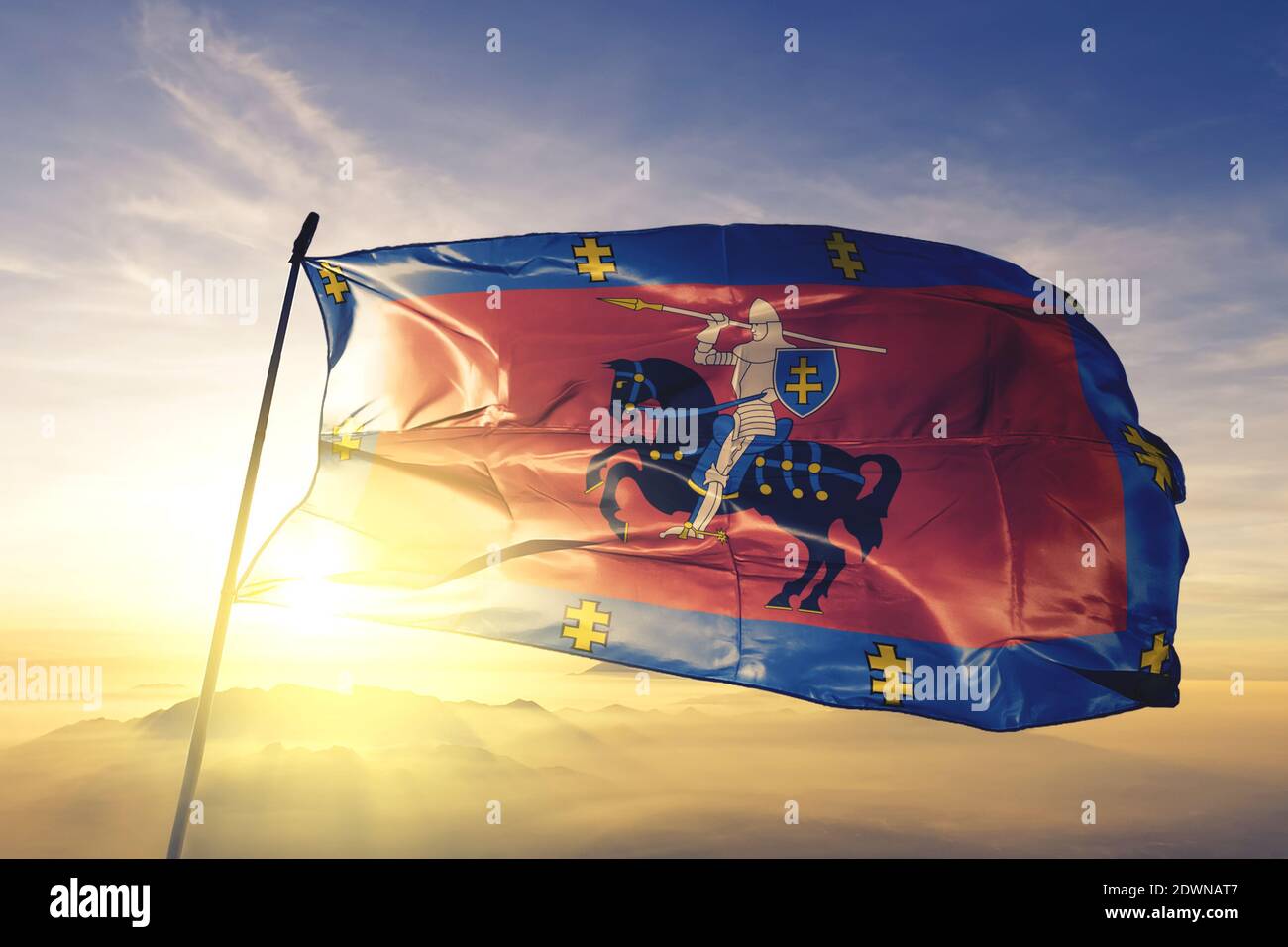 Vilnius county of Lithuania flag waving on the top sunrise mist fog Stock Photo