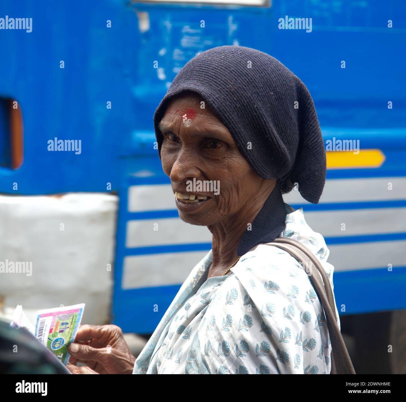 Lady in the street  - Cochin, India Stock Photo