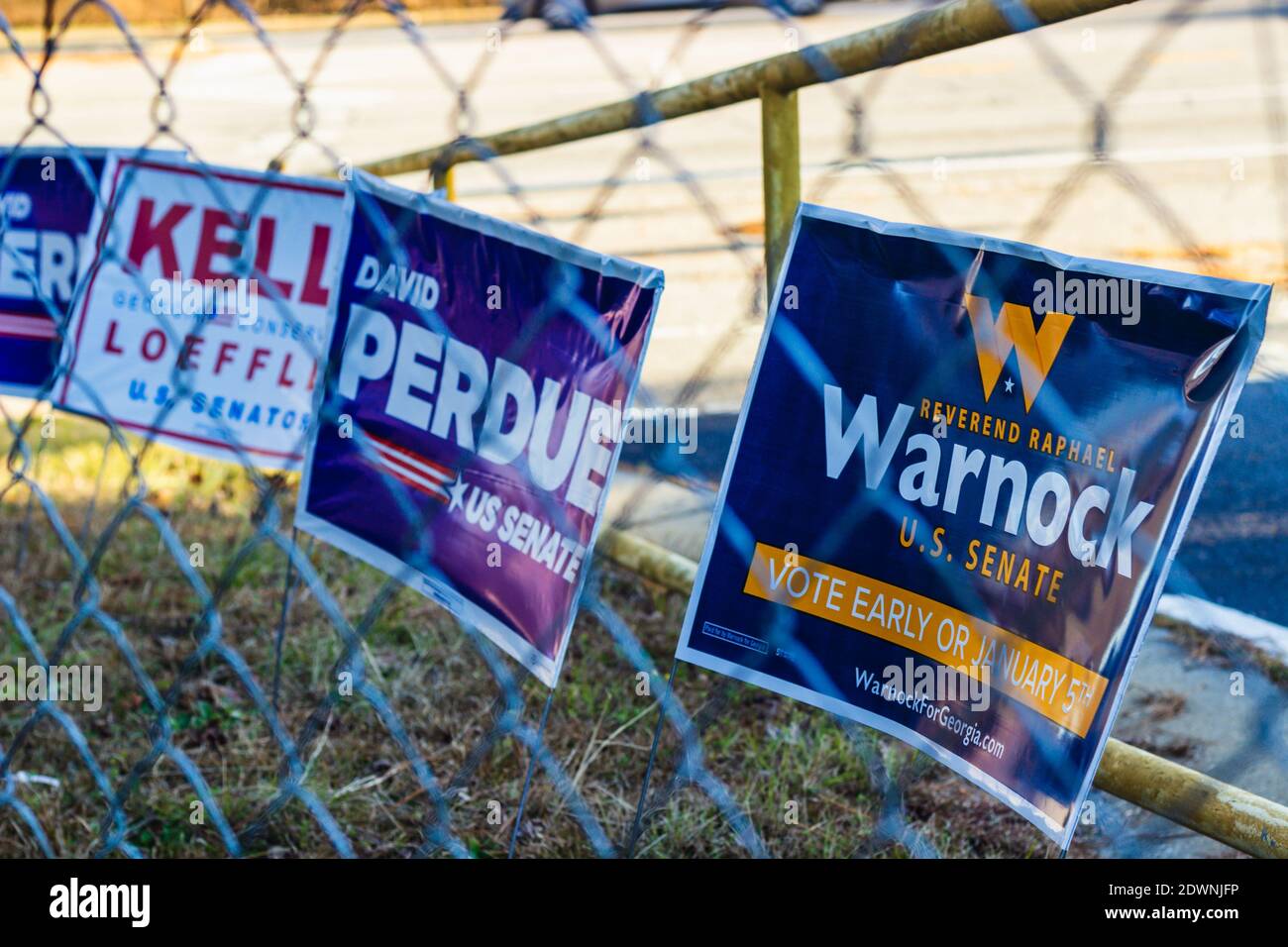 LAWRENCEVILLE, UNITED STATES - Dec 22, 2020: Lawrenceville, Georgia | United States - December 22 2020: Georgia Senate runoff election signs along the Stock Photo