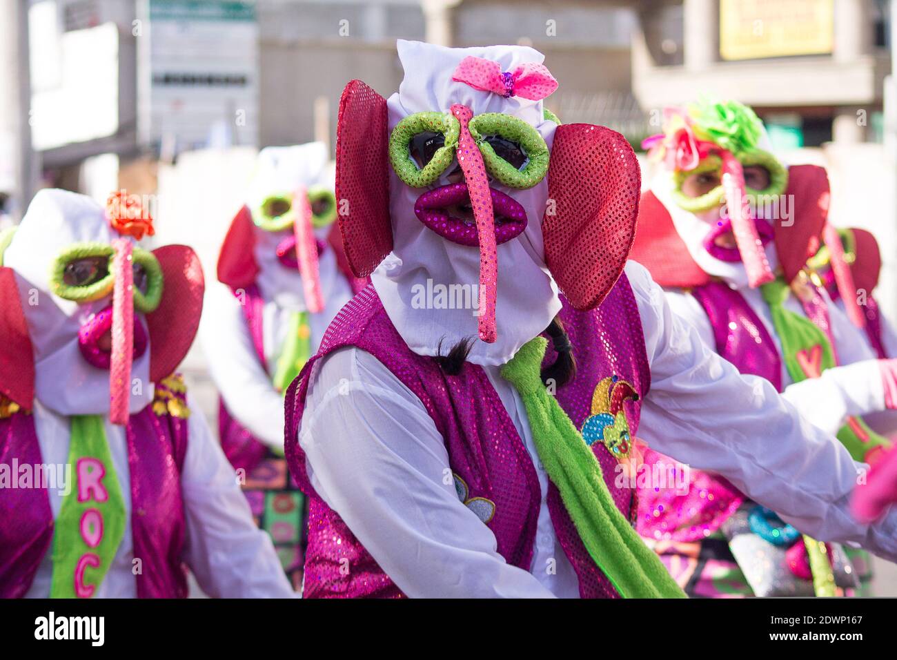 BARRANQUILLA, COLOMBIA - Feb 13, 2018: A group of characters from Monocuco pass through the cheerful troupe of the Battle of Flowers of the Barranquil Stock Photo