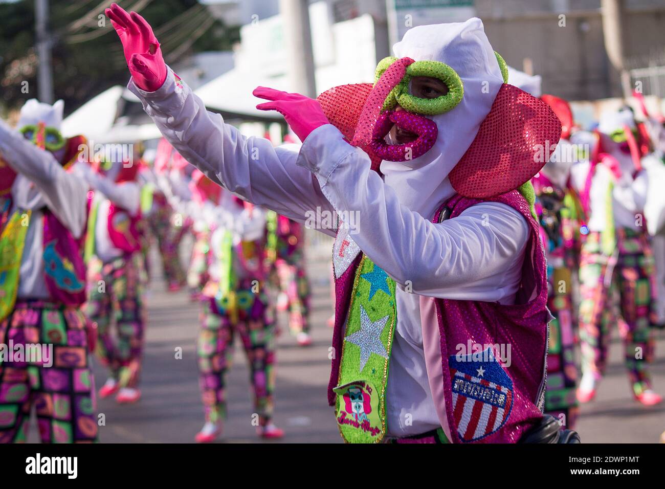 BARRANQUILLA, COLOMBIA - Feb 13, 2018: A group of characters from Monocuco pass through the cheerful troupe of the Battle of Flowers of the Barranquil Stock Photo
