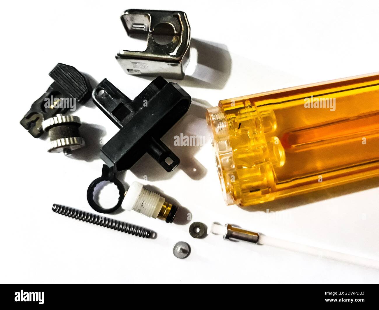 High Angle View Of Cigarette Lighter Parts On Table Stock Photo - Alamy