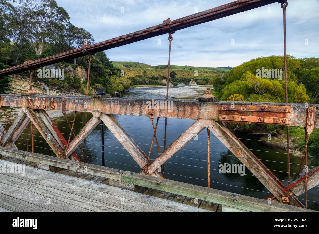 The 1899 Clifden Suspension Bridge spanning the the Waiau River, South Island, New Zealand. Designed by C.H.Howarth. Category I Historic Place. Stock Photo