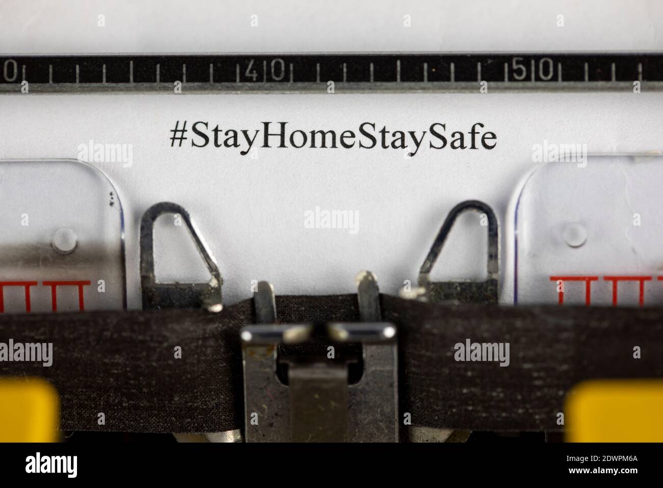 Stay Home written on an old typewriter Stock Photo