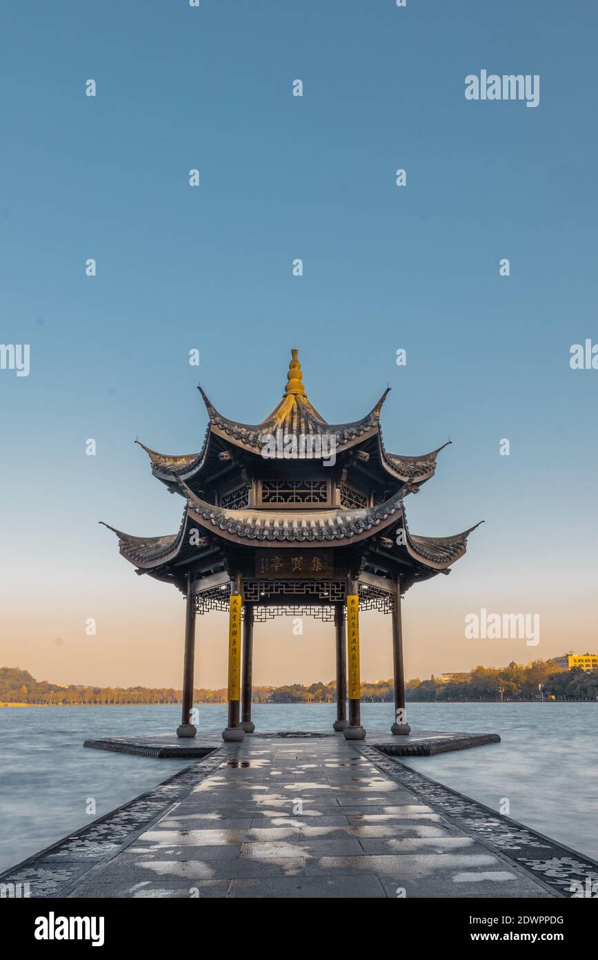 Sunrise view of Jixian pavilion, the historic landmark in at West Lake, in Hangzhou, China. Stock Photo