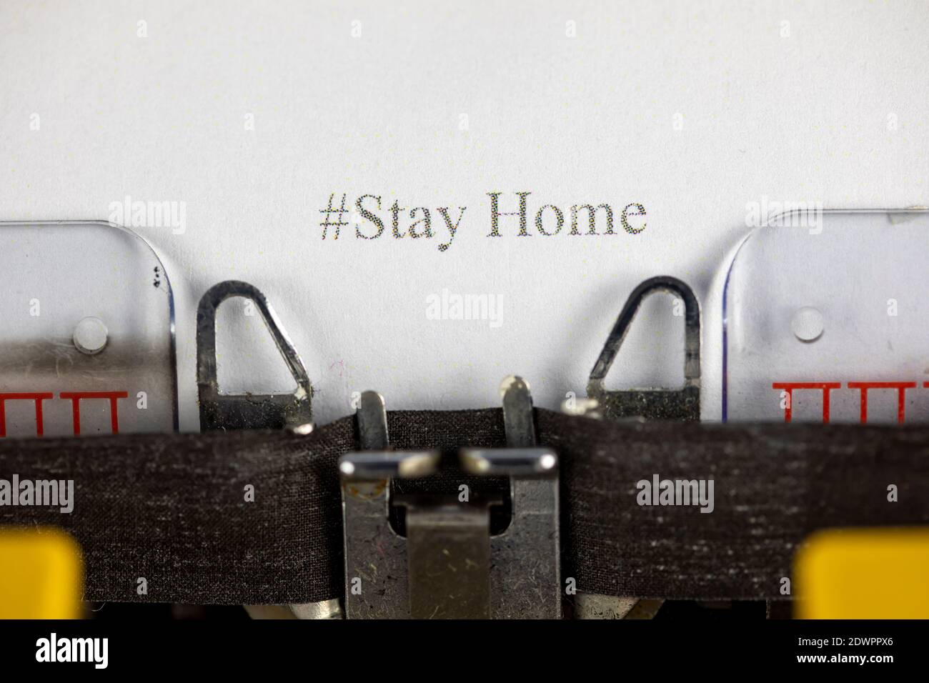 Stay Home written on an old typewriter Stock Photo