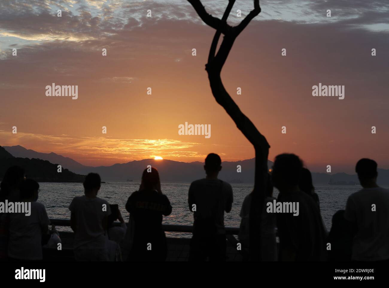 Hong Kong, China. 30th Apr, 2020. Photo shows a sunset view in Hong Kong, south China, April 30, 2020. Credit: Li Gang/Xinhua/Alamy Live News Stock Photo