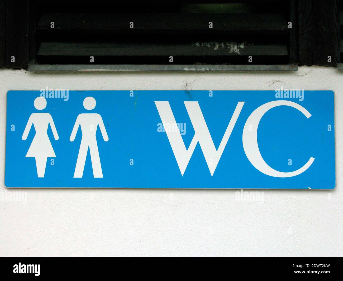 a toilet or WC sign for a public restroom, body hygiene and basic needs
