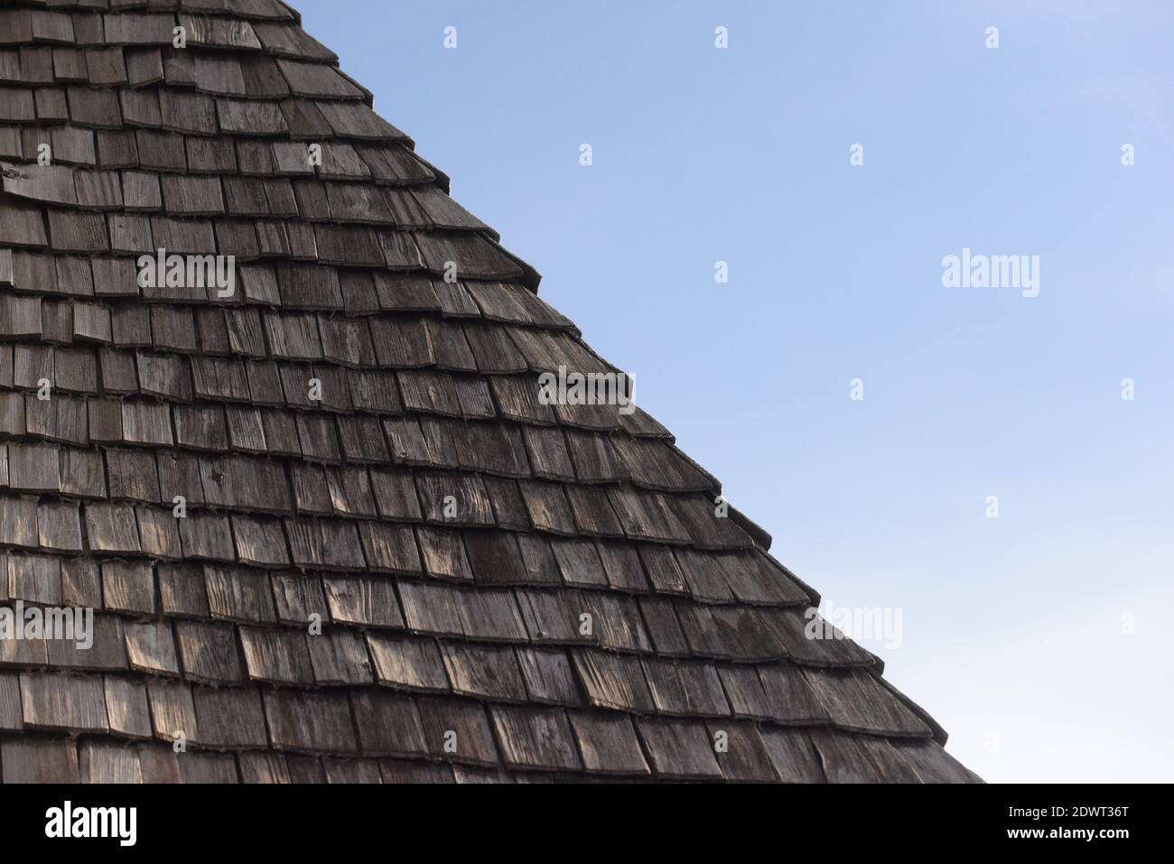 wooden shingle on a house roof at an old farmers house Stock Photo