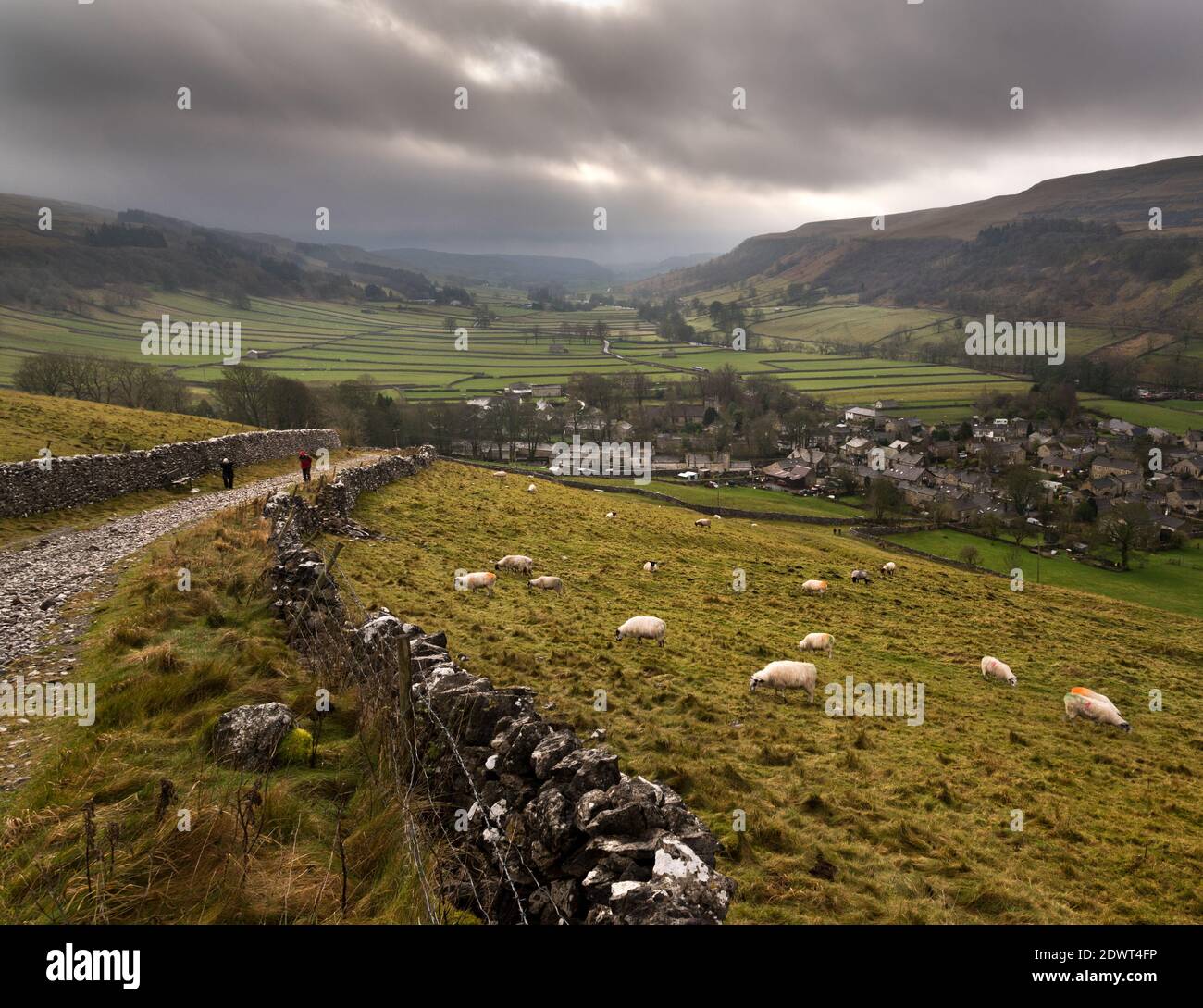 A rainy December day in Wharfedale, Yorkshire Dales National Park, UK. Kettlewell villages lies at the bottom of the hill. Stock Photo