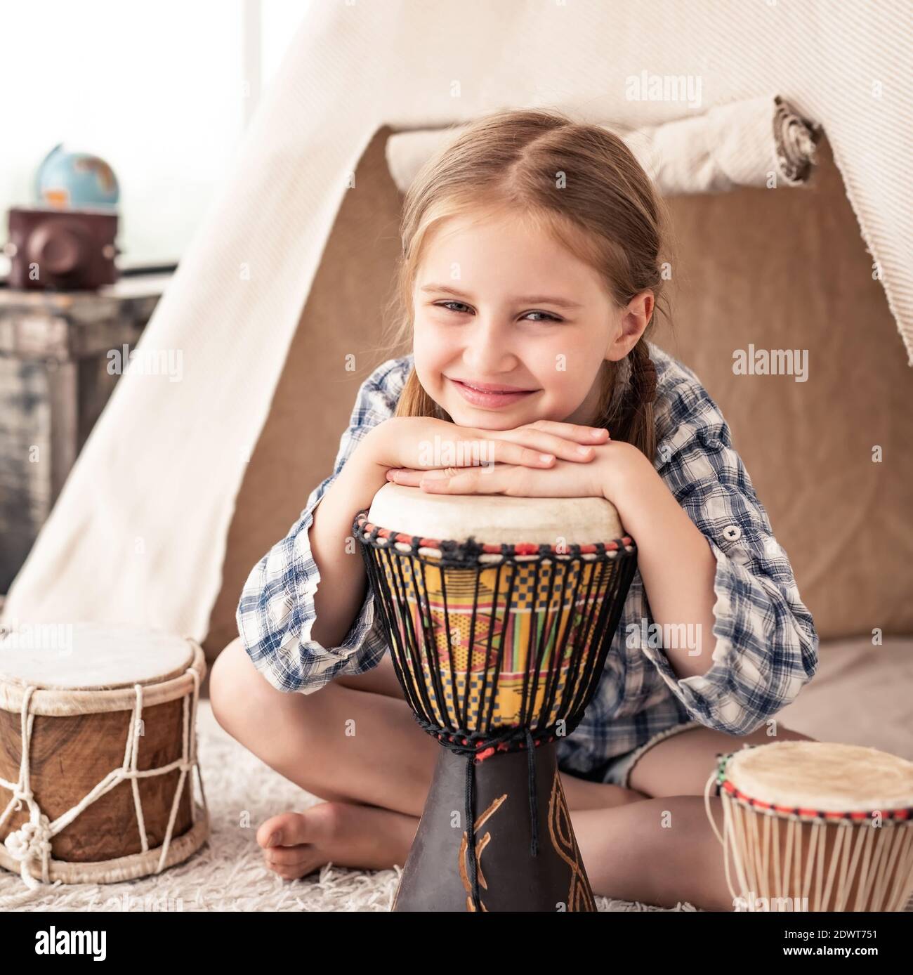 Girl playing drums hires stock photography and images Alamy