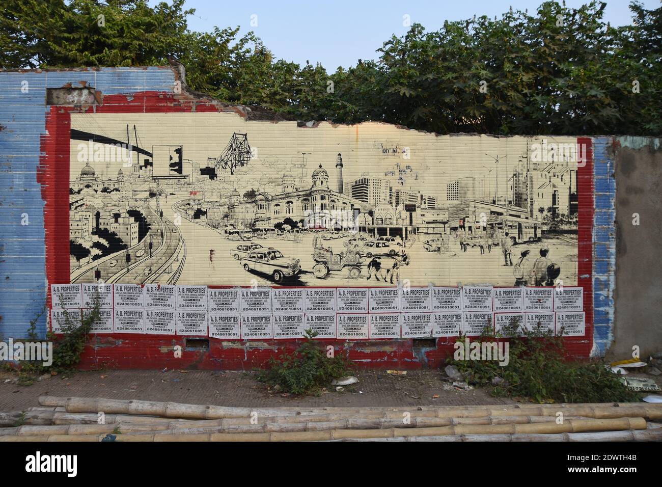 Mural of Kolkata on a broken wall at Kalikapur Road, Kolkata. Stock Photo