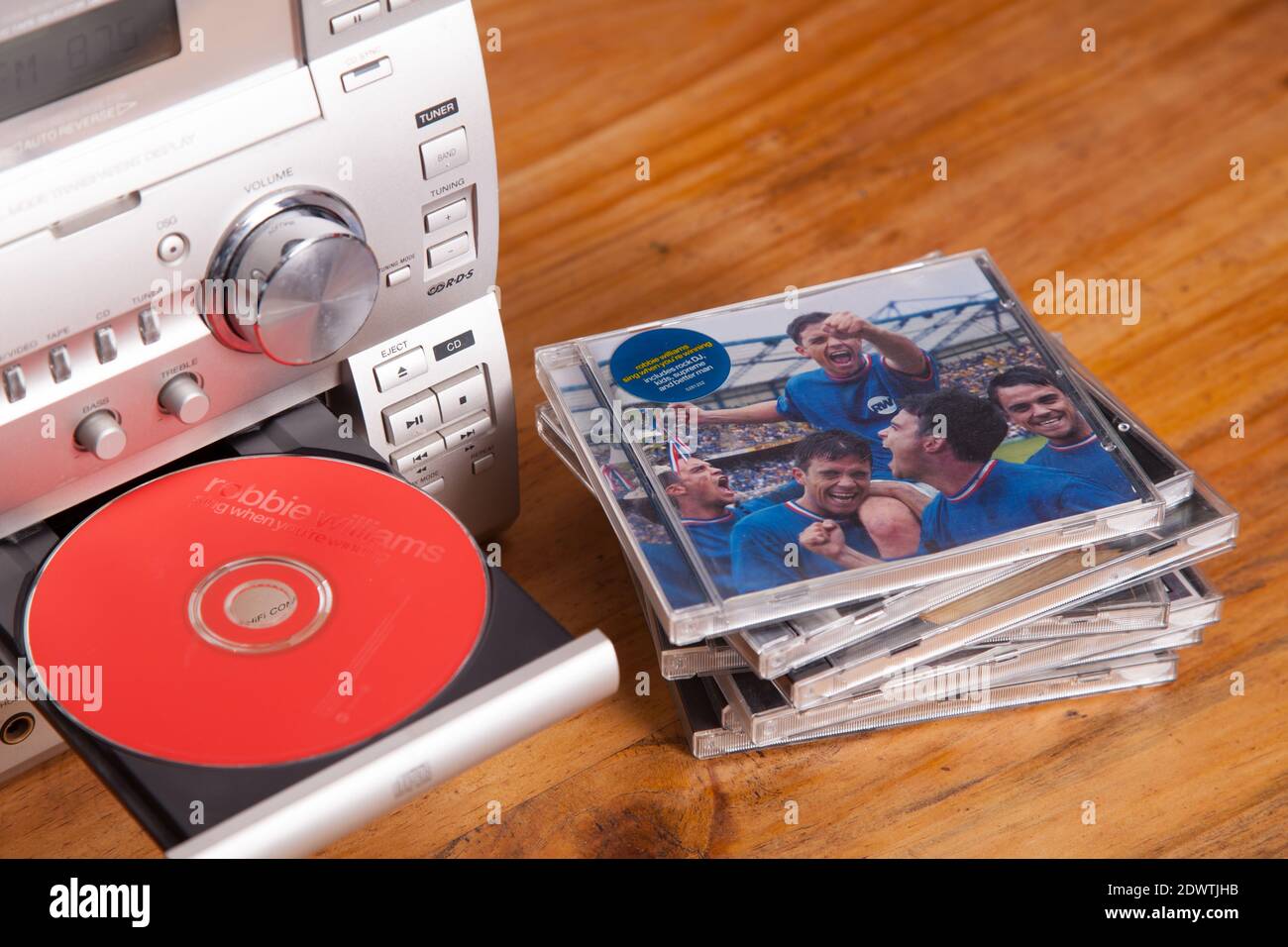 Music CD in Sony hi-fi system, Robbie Williams Sing When You're Winning  album compact disc Stock Photo - Alamy