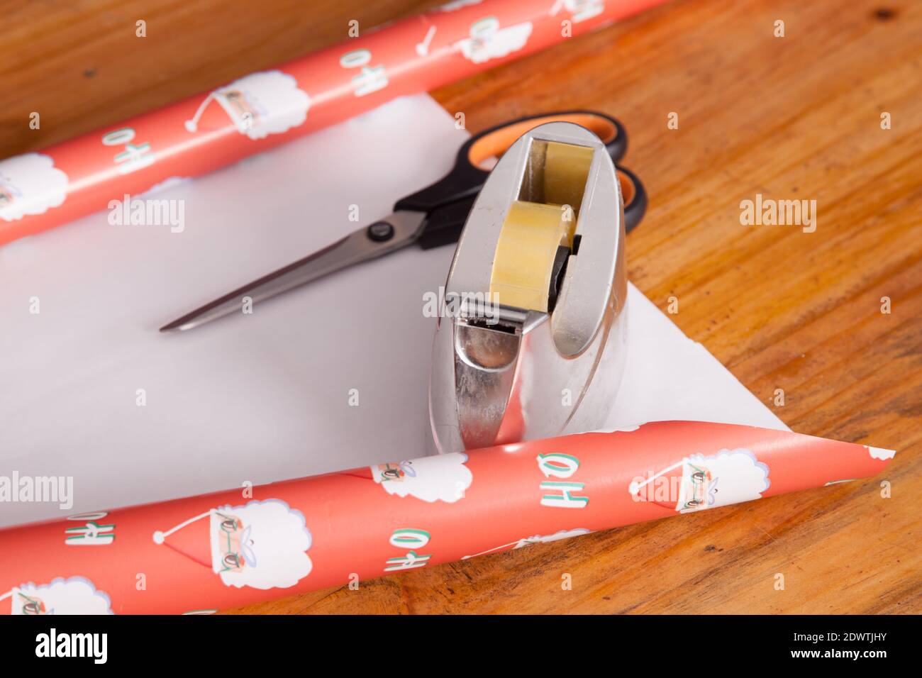 Scissors, Tape, Ribbon And Wrapping Paper On A Gift Box. Focus On Tape  Dispenser. Shallow Depth Of Field. Stock Photo, Picture and Royalty Free  Image. Image 259447.