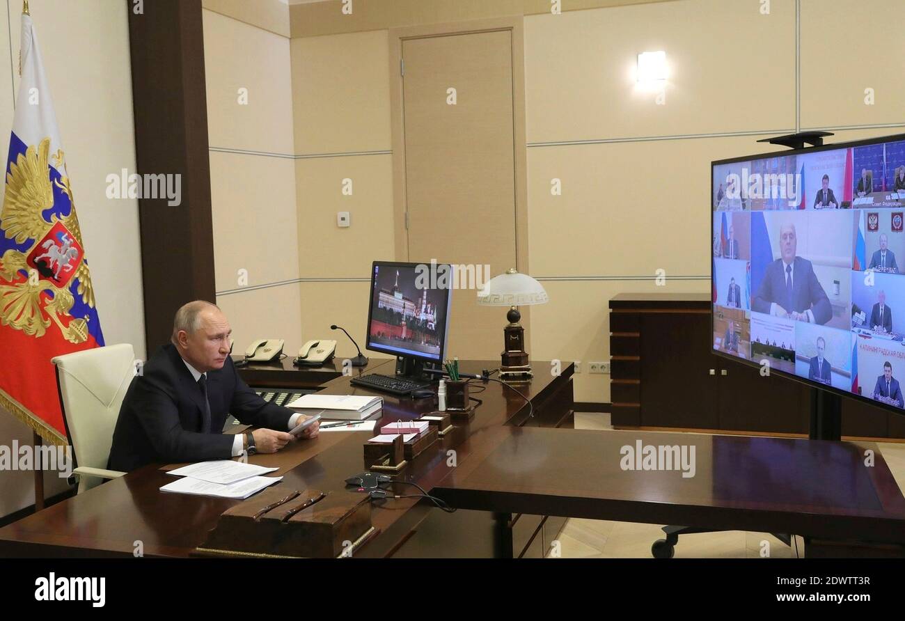 Moscow, Russia. 23rd Dec, 2020. Russian President Vladimir Putin, chairs a video conference meeting with chaired a joint meeting of the State Council and the Council for Strategic Development and National Projects from the Novo-Ogaryovo official residence December 23, 2020 outside Moscow, Russia. Credit: Mikhail Klimentyev/Kremlin Pool/Alamy Live News Stock Photo