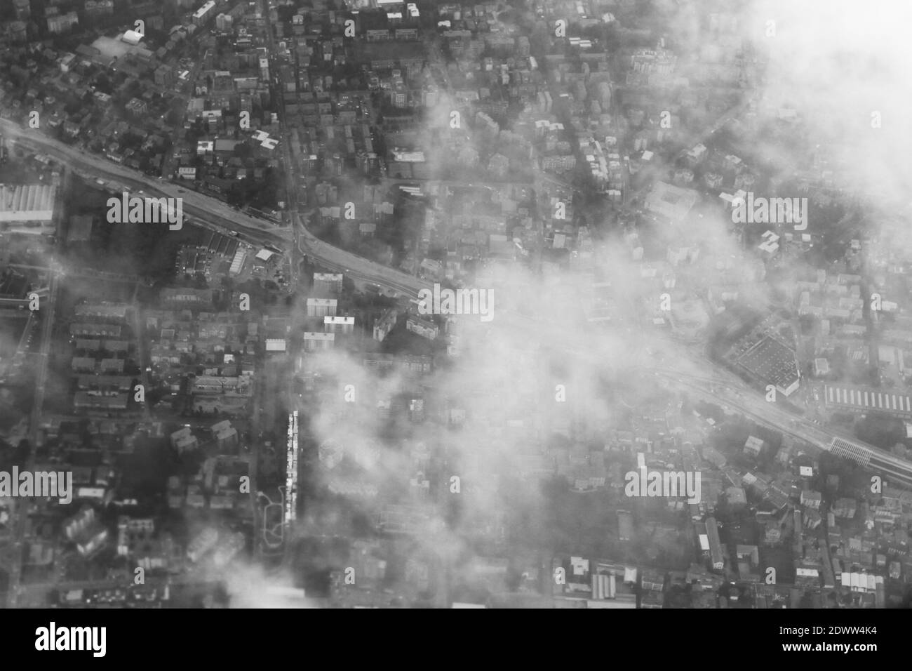 Top view of european city in grey day with clouds. Climate change and