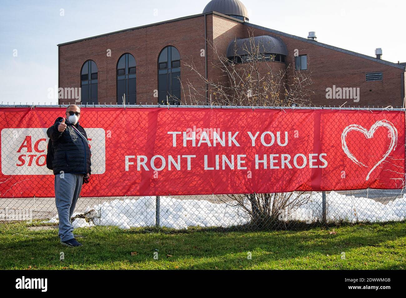 Latin American man thanking the Front Line workers during the Covid-19 pandemic, Toronto, Canada Stock Photo