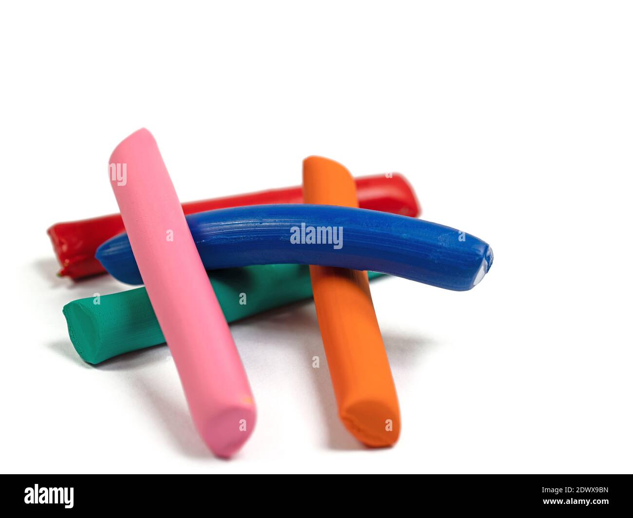 Colorful plasticine against a white background Stock Photo
