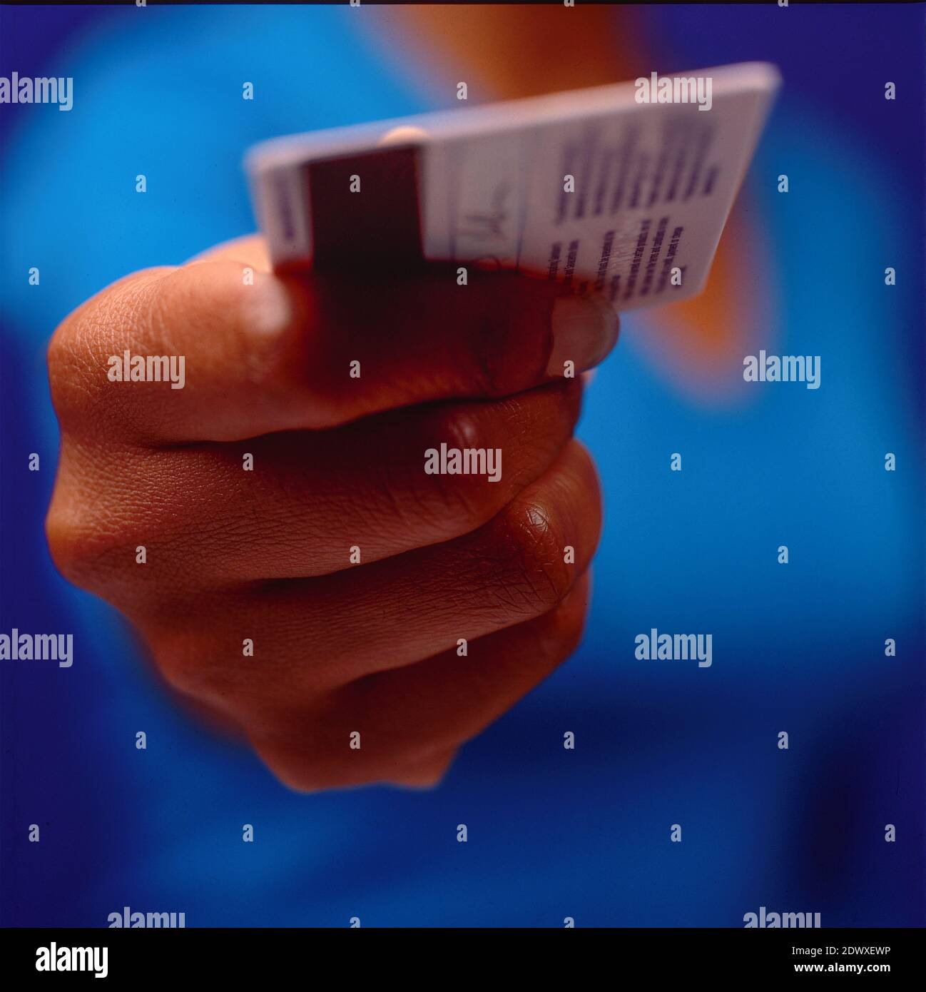 Holding Credit card Stock Photo - Alamy
