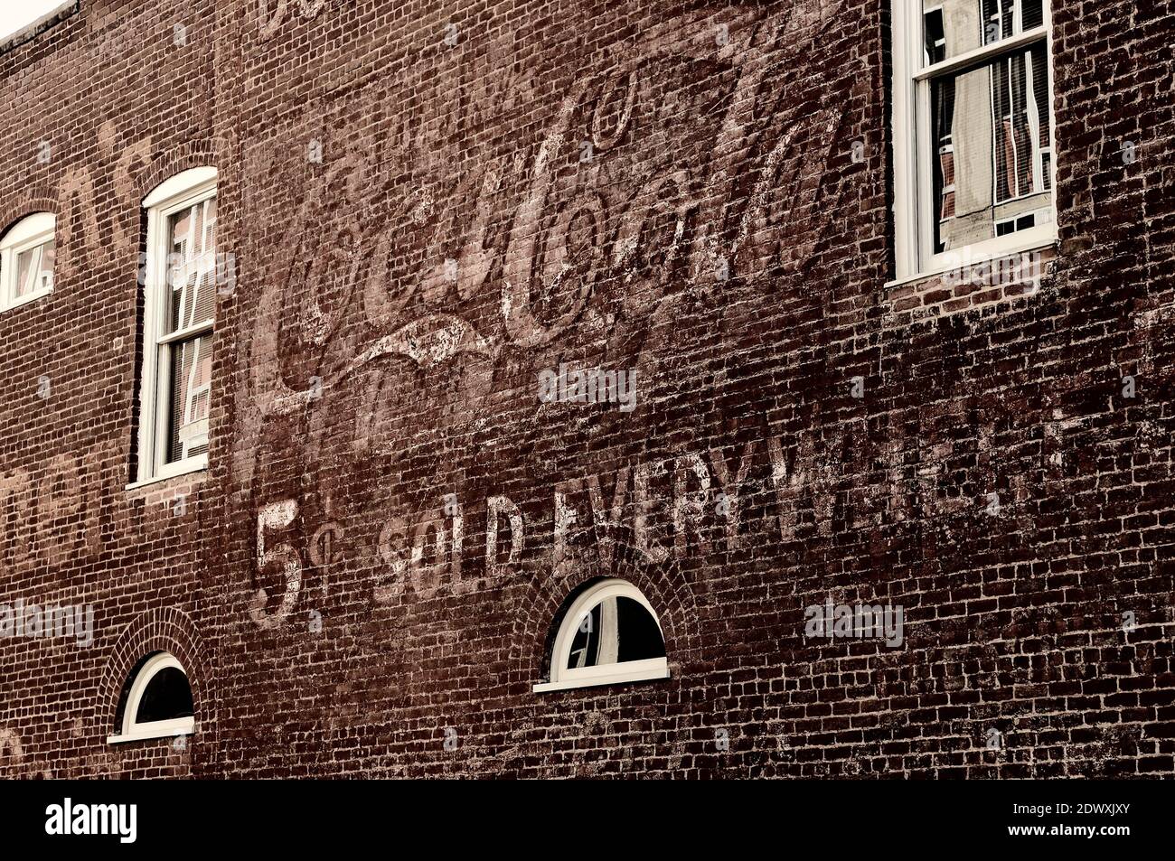 A vintage ad for Coca-Cola - a faded mural on a building wall in the Historic Downtown Mall, Charlottesville, Virginia, USA Stock Photo