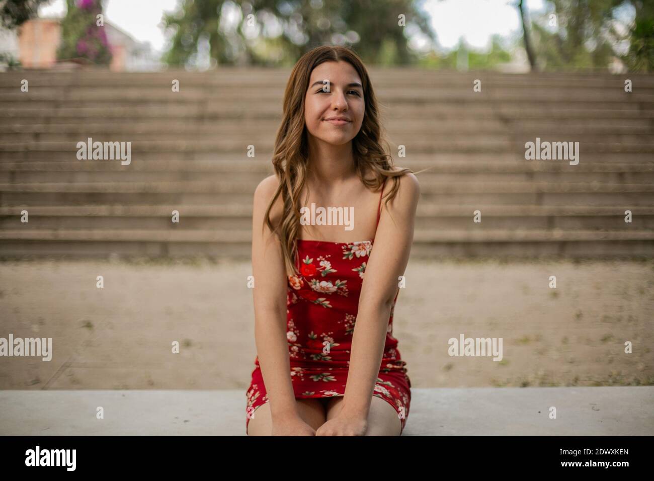 Woman park flowers behind hi-res stock photography and images - Alamy