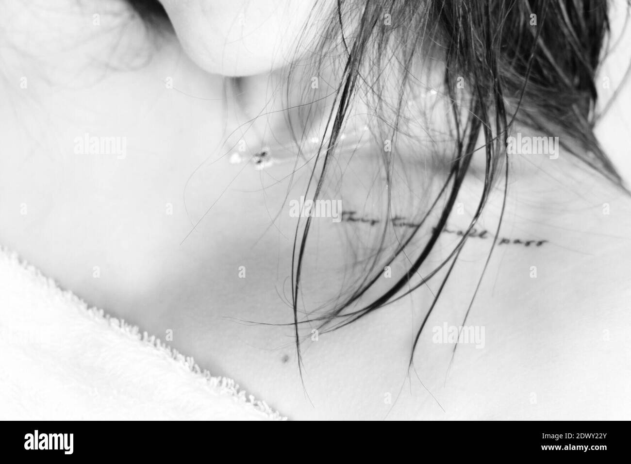 Tattoo on woman shoulder Black and White Stock Photos & Images - Alamy