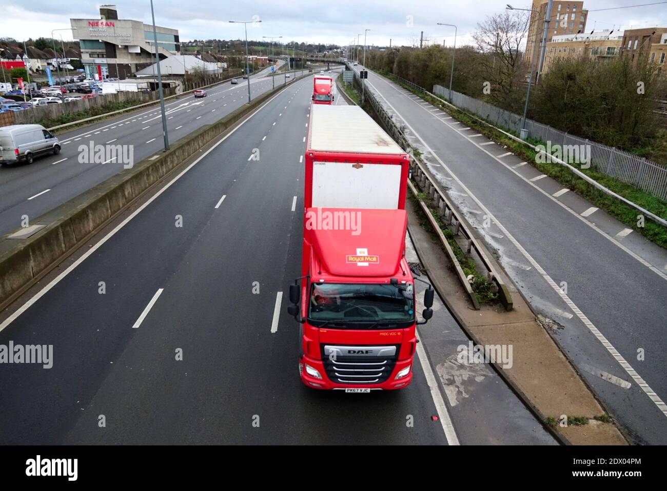 Royal Mail lorries delivering post during the busiest time of year for