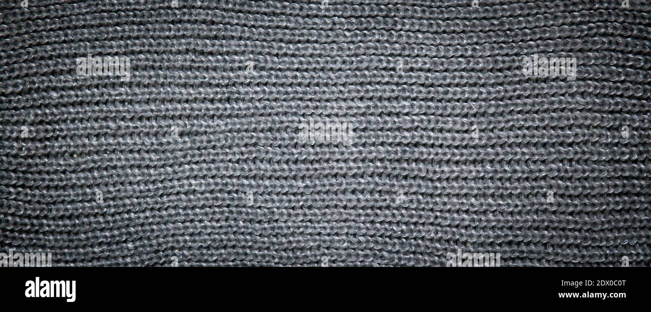 knitted background. Gray wool knitted fabric. plain knit Stock Photo