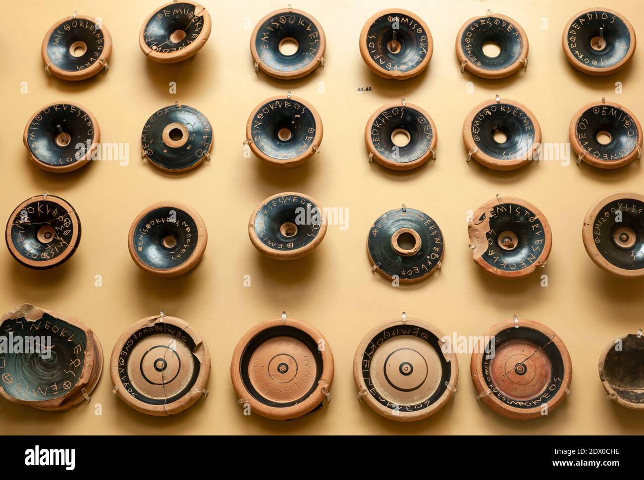 Ostracons with names on display in the Ancient Agora Museum in Athens, housed in the Stoa of Attalus, Athens, Greece Stock Photo