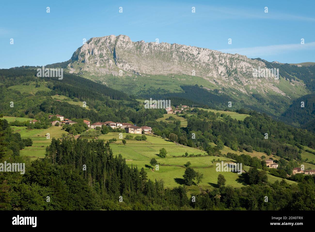 Itxina mountain with Zaloa and Urigoiti villages, Orozko, Basque Country in Spain Stock Photo