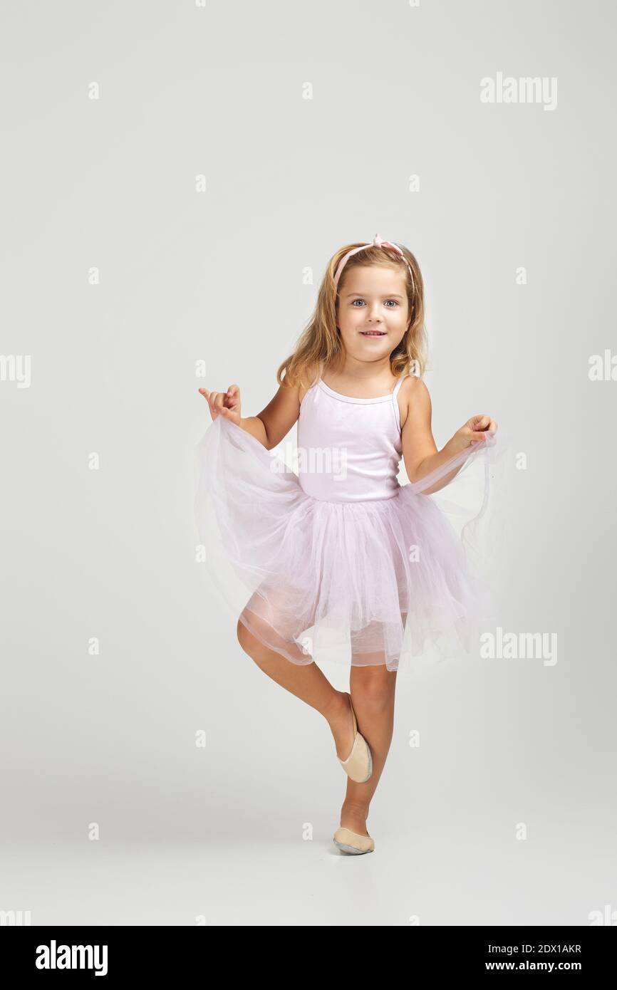 cute little child girl dreams of becoming a ballerina. ballet dancer in pink tutu Stock Photo Alamy