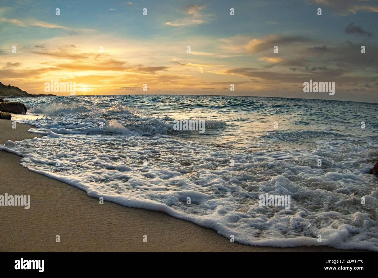 Foamy ocean wave washing sandy hi-res stock photography and images - Alamy