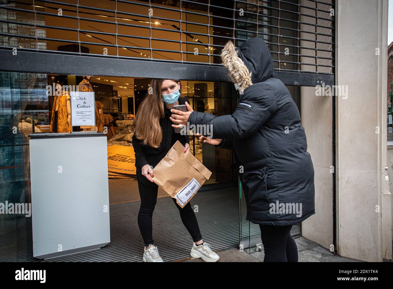 Collection at a Zara store in order to facilitate the collection of online orders.Non essential retail stores remain temporarily closed to the public Stock Photo