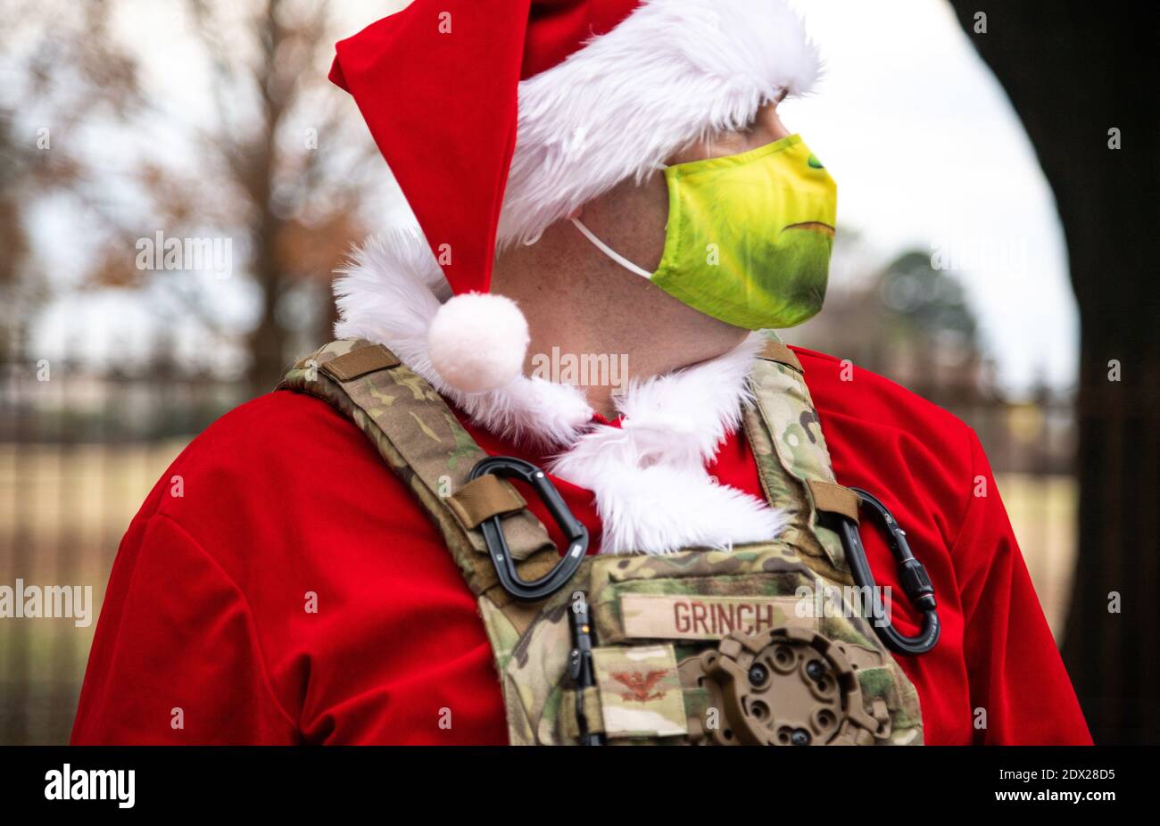 Bossier City, Louisiana, USA. 23rd Dec 2020. U.S. Air Force Col. Mark Dmytryszyn, 2nd Bomb Wing commander, wears a Grinch costume to celebrate the holiday spirit at Barksdale Air Force Base December 23, 2020 in Bossier City, Louisiana. Credit: Planetpix/Alamy Live News Stock Photo