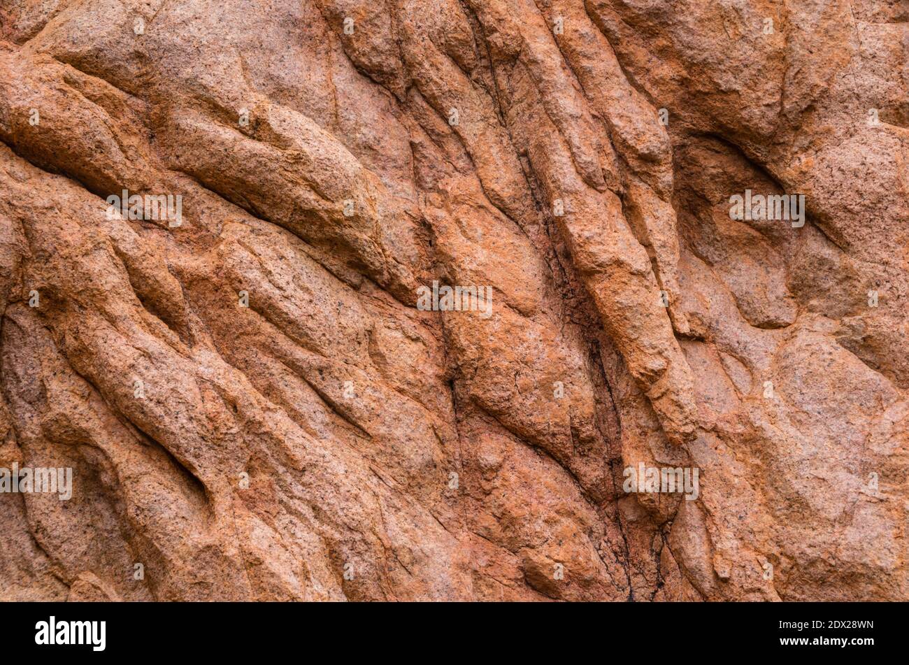 Close-up red textured granite rock, west coast corsica. Perfect as texture or background Stock Photo