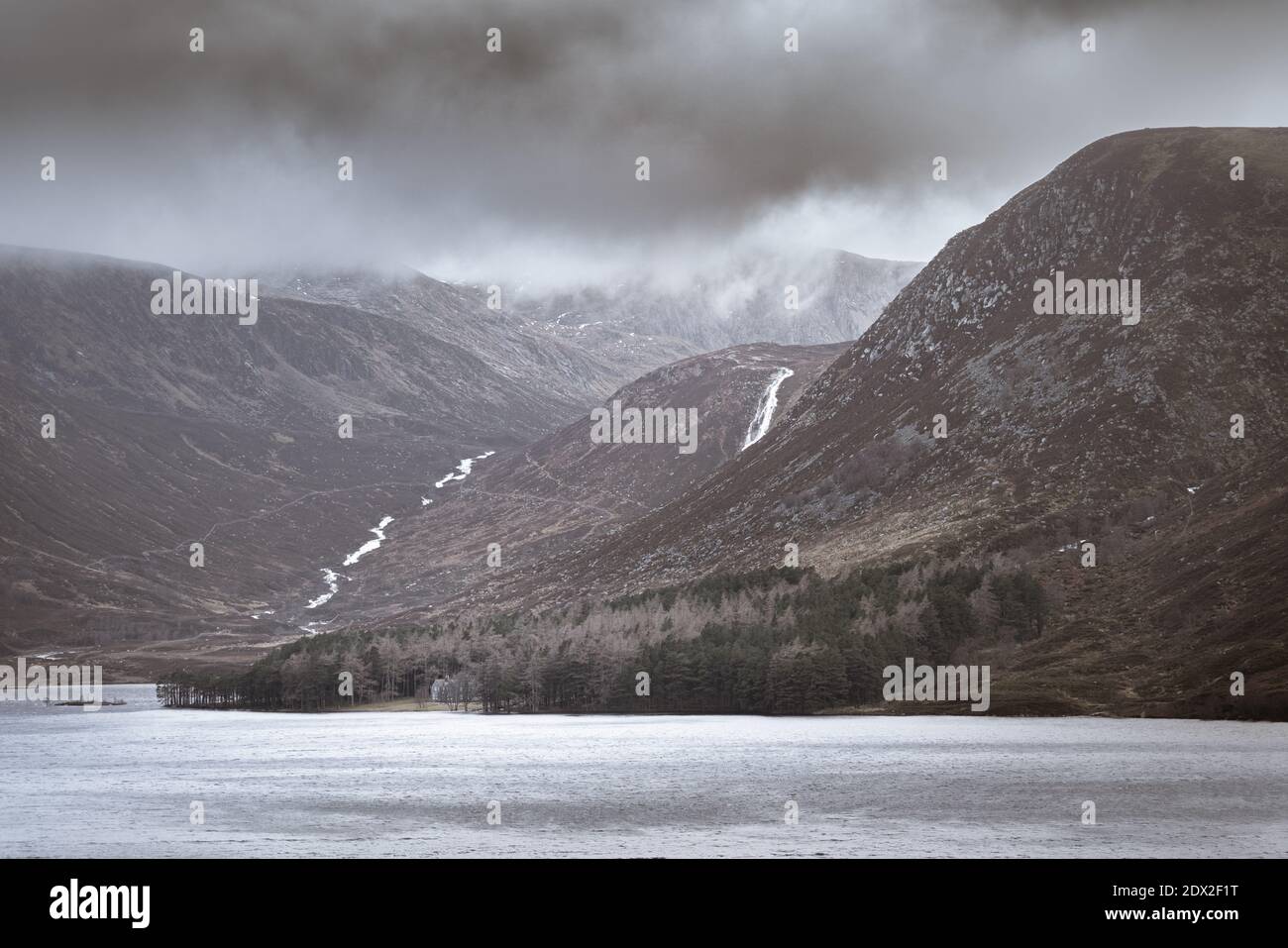 Glas Allt Shiel bothy by the shore of Loch Muick in Cairngorms National Park, Scotland Stock Photo