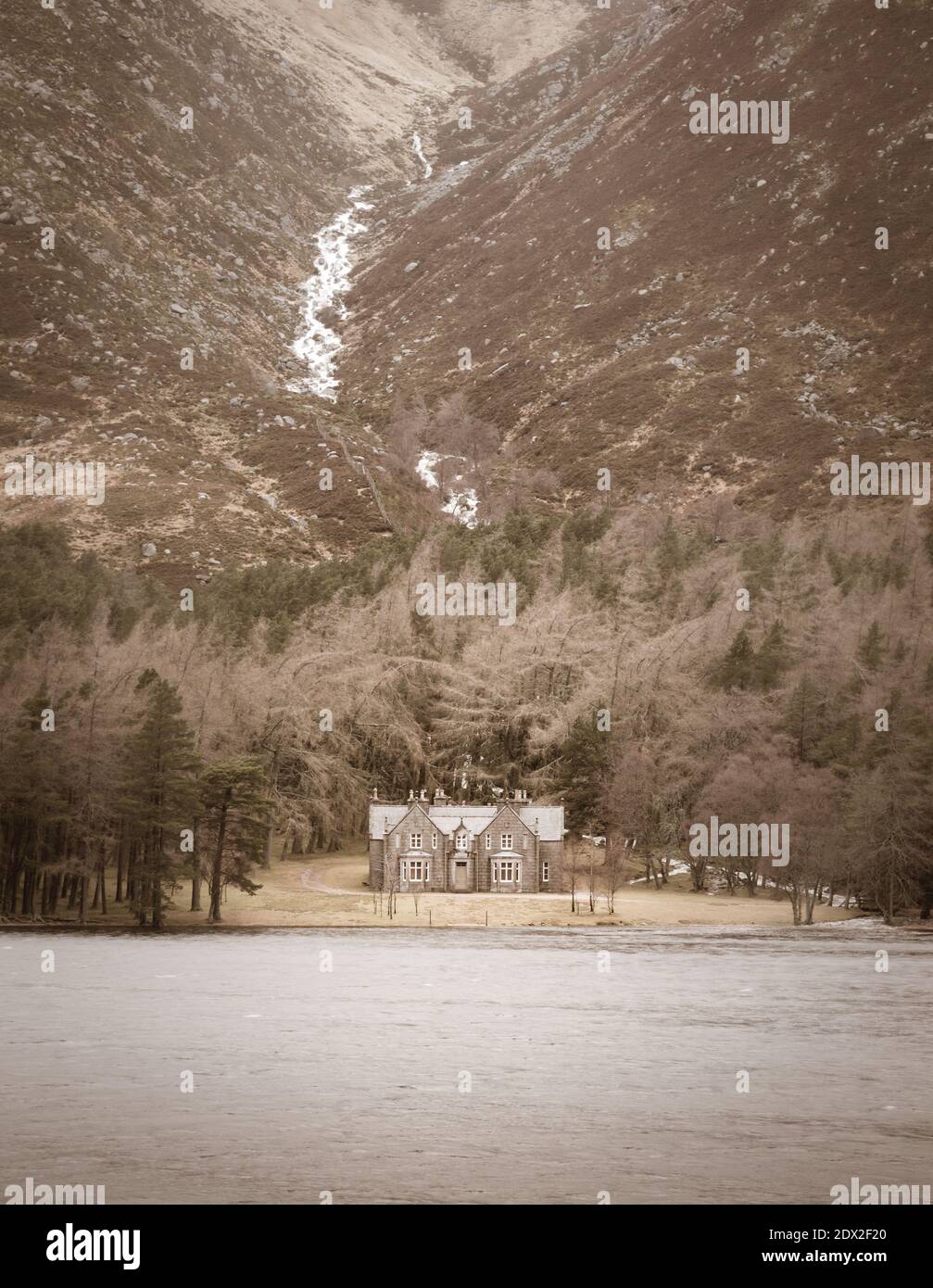 Glas Allt Shiel bothy by the shore of Loch Muick in Cairngorms National Park, Scotland Stock Photo
