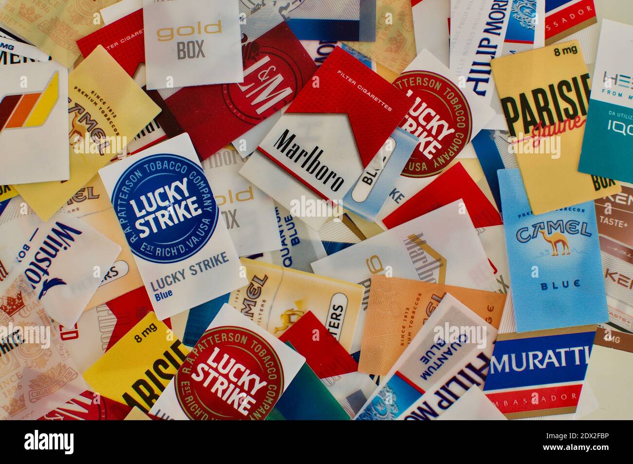 switzerland cigarette brands Cadro, Ticino, Switzerland - 28th November 2020 : Cigarettes tags flat lay  of many different tobacco brands Stock Photo