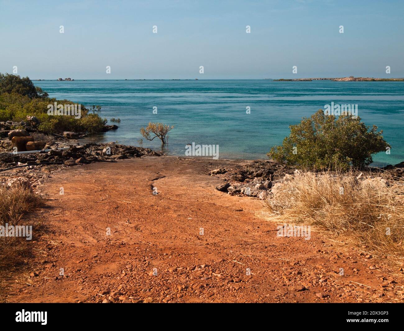 Looking past mangroves across King Sound to the Buccaneer Archipelago, One Arm Point, Dampier Peninsula, Western Australia Stock Photo