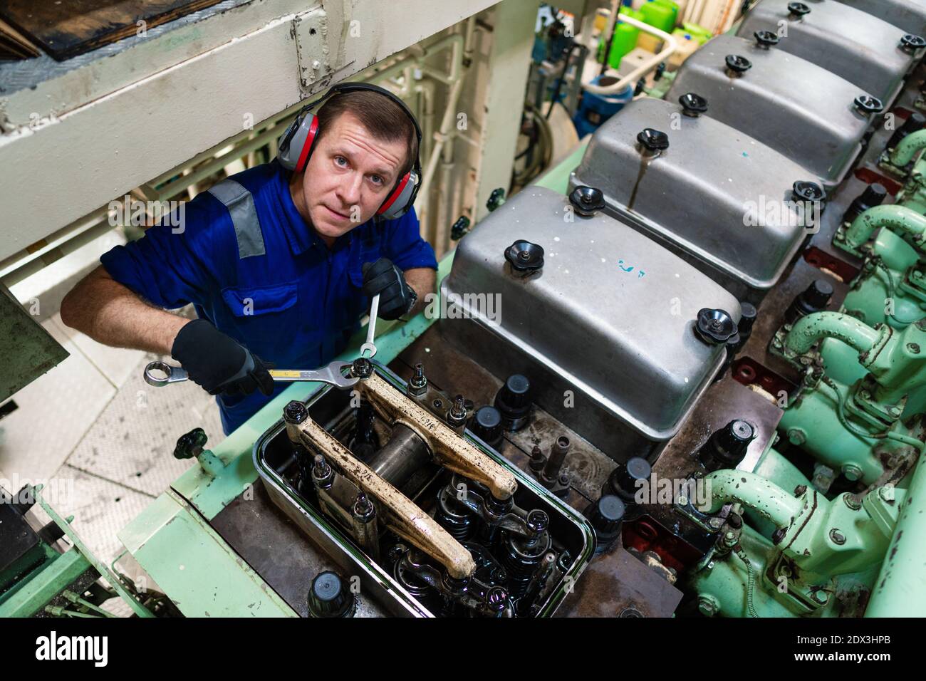 Marine engineer officer controlling vessel enginesand propulsion in ...