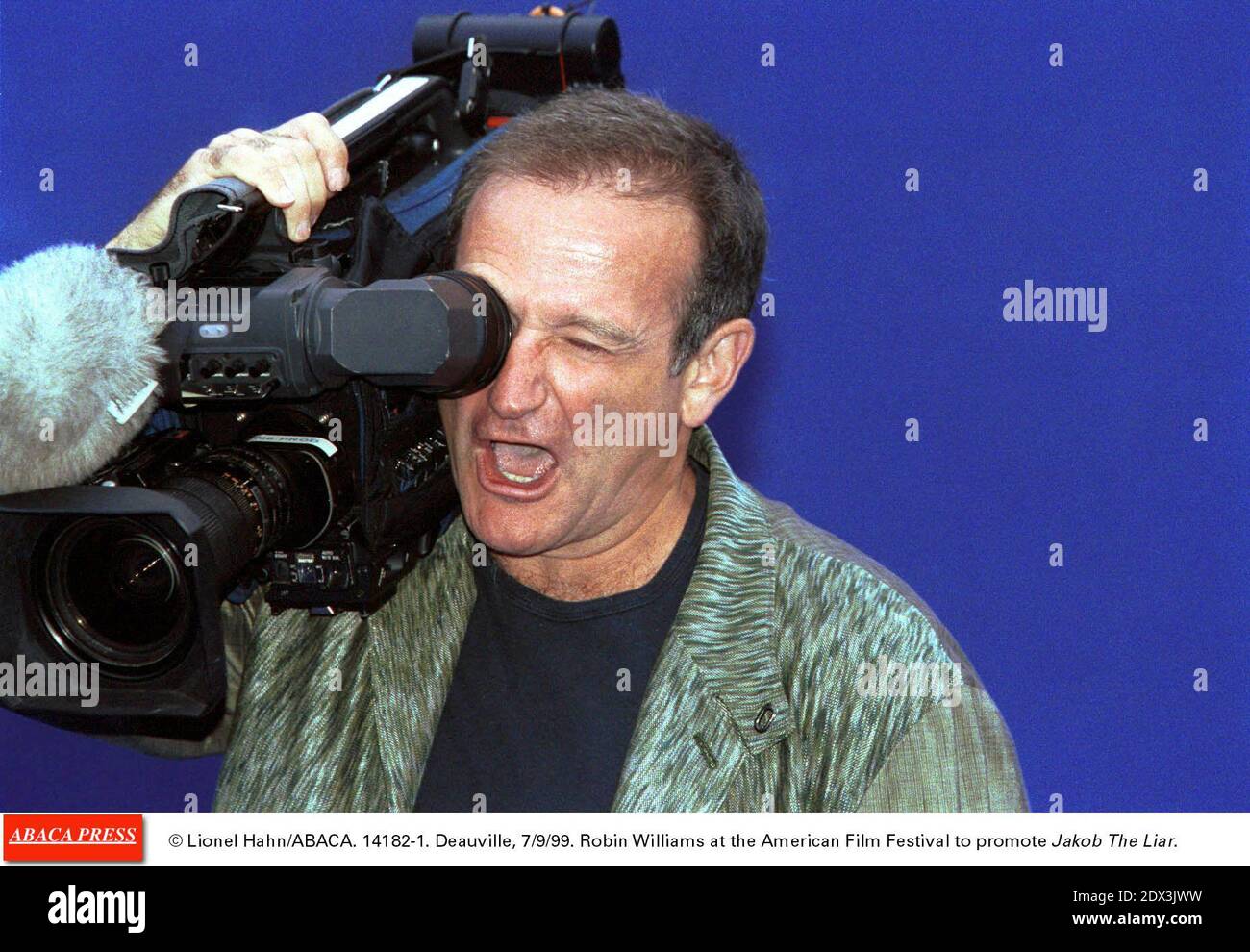 US actor Robin Williams has been found dead, aged 63, in an apparent suicide, California police say Monday August 11, 2014. Marin County Police said he was pronounced dead at his home shortly after officials responded to an emergency call around noon local time. Williams was famous for films such as Good Morning Vietnam and Dead Poets Society and won an Oscar for his role in Good Will Hunting; File photo : © Lionel Hahn/ABACA. 14182-1. Deauville, 7/9/99. Robin Williams at the American Film Festival to promote Jakob The Liar. Stock Photo