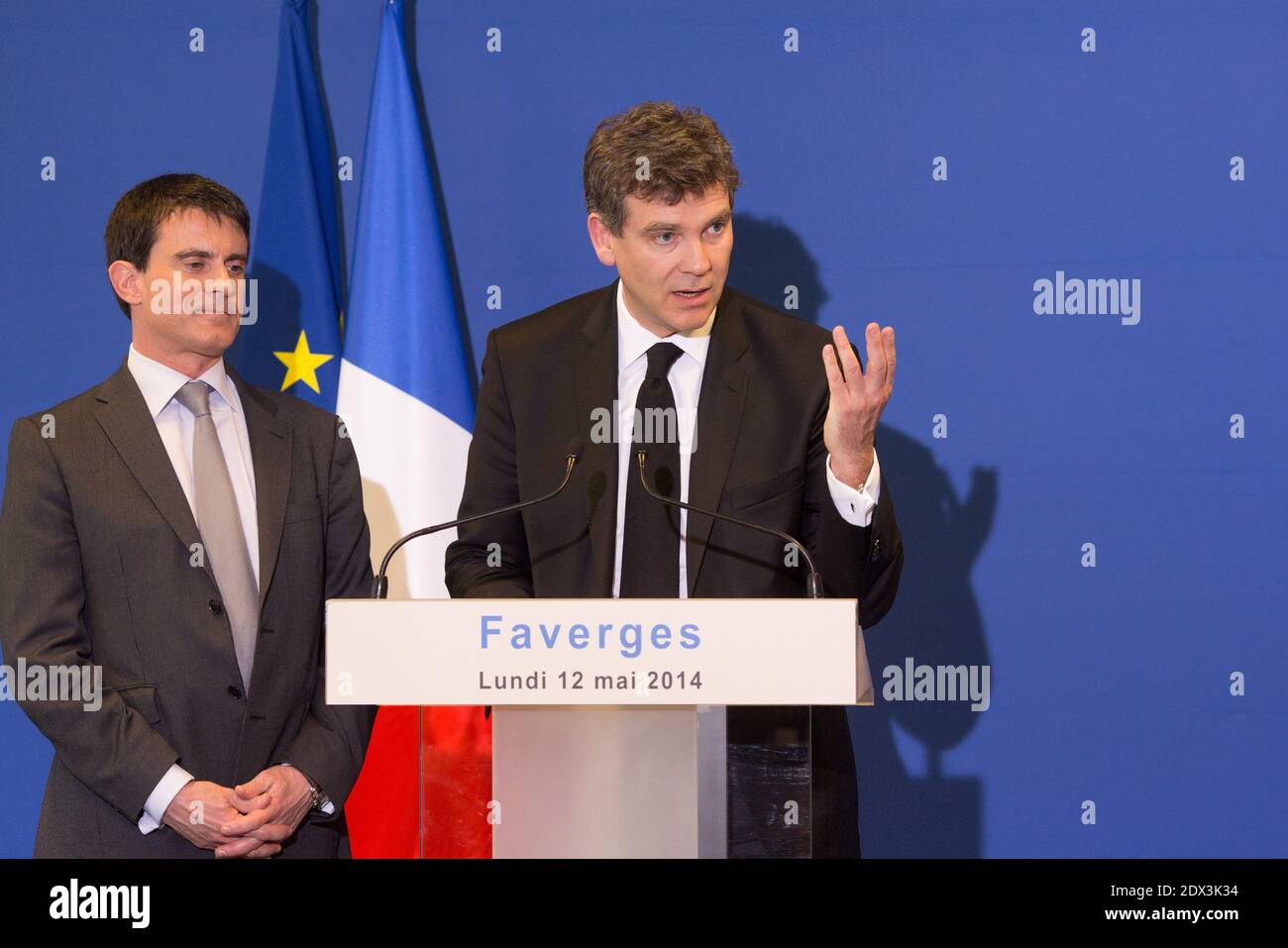 French PM Manuel Valls has submitted the government's resignation to President Francois Hollande and has been asked to form a new cabinet. The government was badly shaken on Sunday by criticism over its handling of the economy by economy minister Arnaud Montebourg. File photo : Arnaud Montebourg and Prime mnnister Manuel Valls visits Straubli plant in Faverges, France wifh the Chairman françois morisse and former nationl assembly president Bernard Accoyer on May 12, 2014. Photos by Vincent Dargent/ABACAPRESS.COM Stock Photo